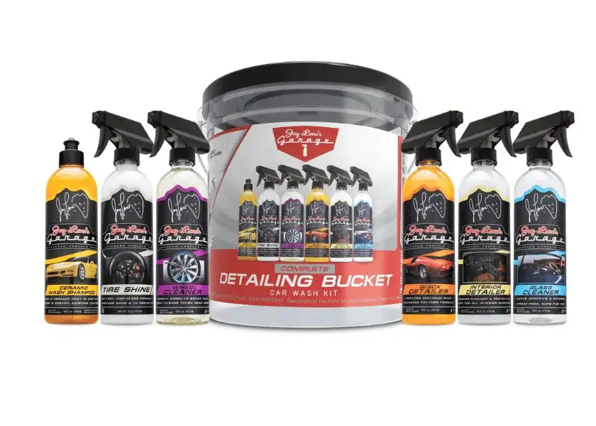 Car wash detailing kit with bottles and a bucket on a white background
